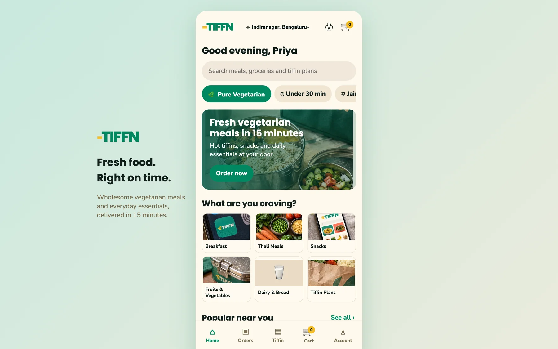 The coded TIFFN app home screen: a greeting, a search bar, vegetarian filters, a hero offer and meal categories